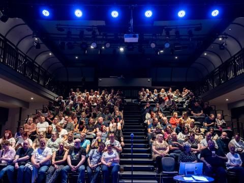 Customers seated for a show in The Studio